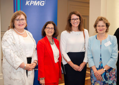 Cath Ingram and Kristy Zwickert from KPMG pose for a photograph with Daryl Karp AM and Frances Adamson