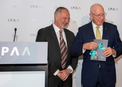 His Excellency congratulates the author of the IPAA History, Frank Exon
